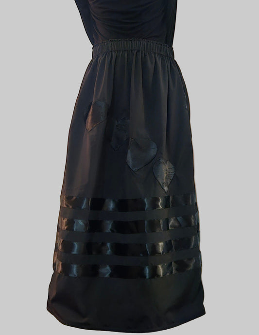 Black on black Ribbon skirt with pockets and applique